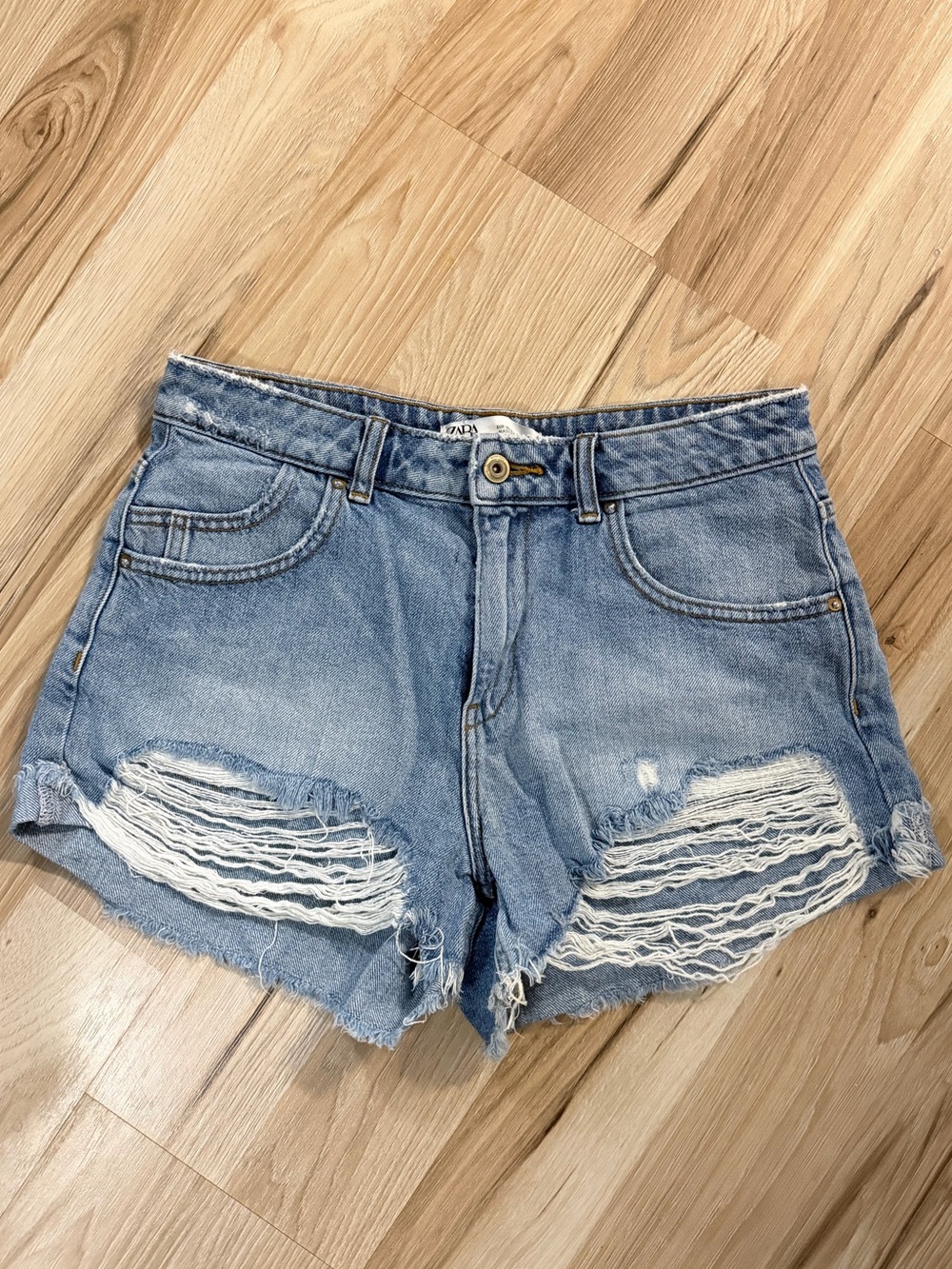 Zara Light Wash Distressed Denim Shorts